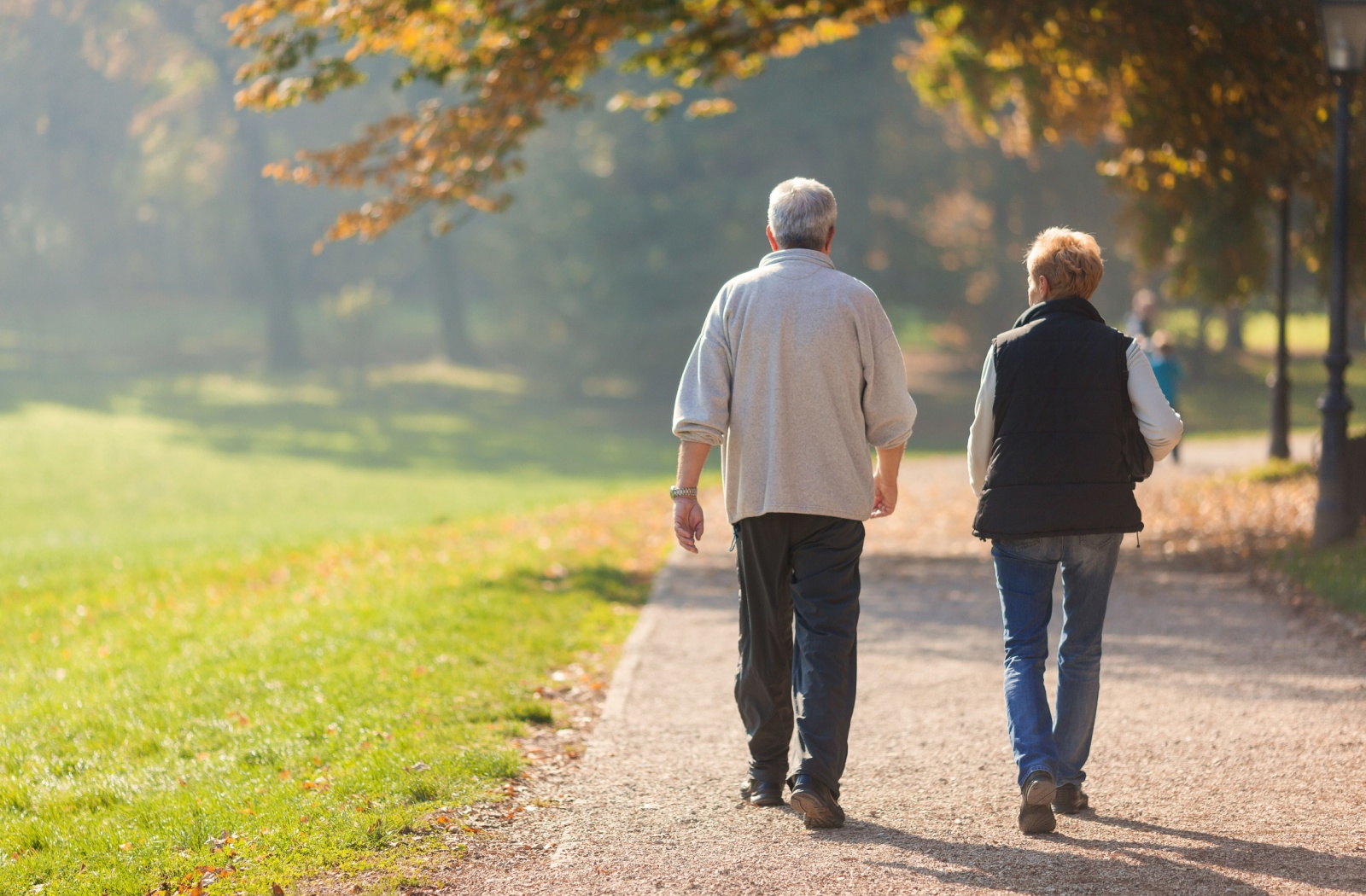 Two seniors out for a walk together.